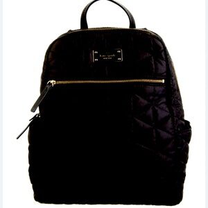 New used twice Kate Spade quilted backpack. In new condition.